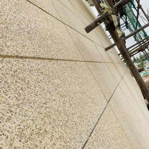 毕节 黄金麻花岗岩荔枝面外墙干挂石材效果示例