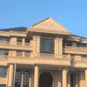 毕节黄金麻别墅外墙干挂石材效果示例