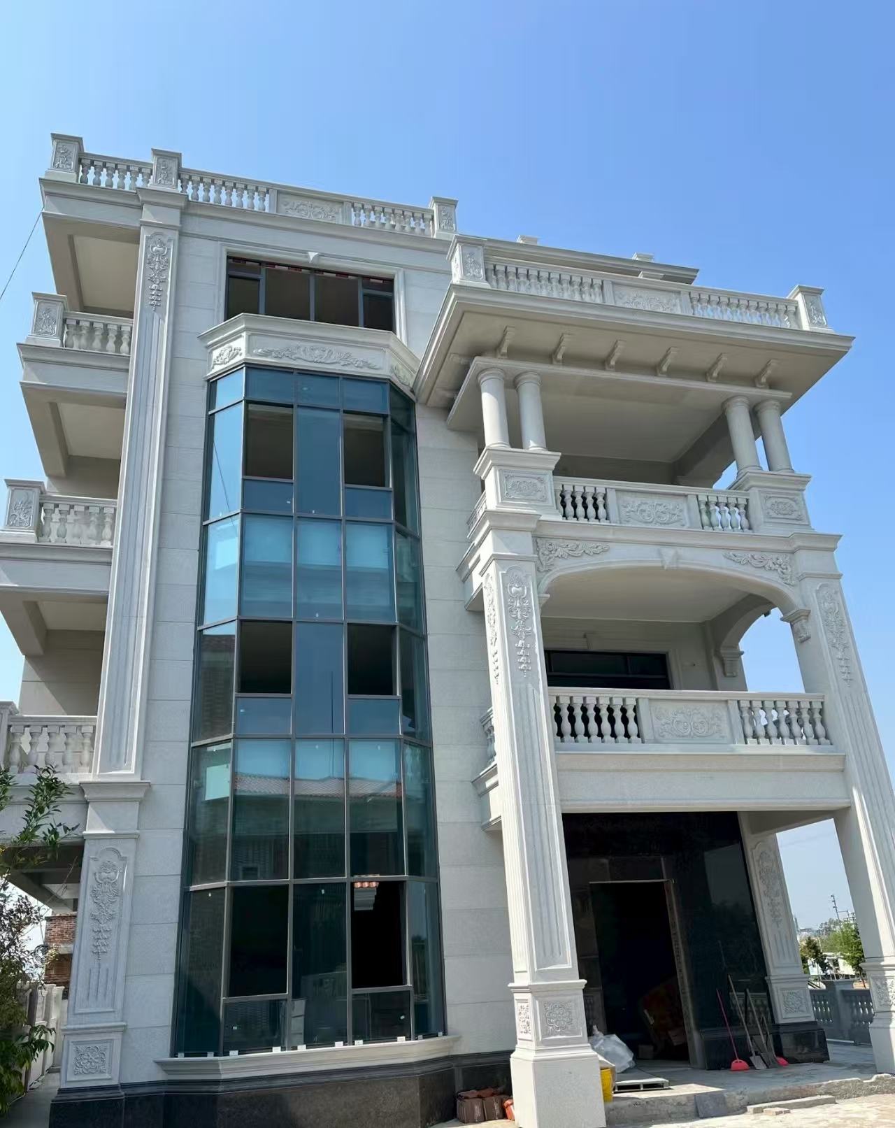 毕节 白麻花岗岩别墅外墙干挂效果展示